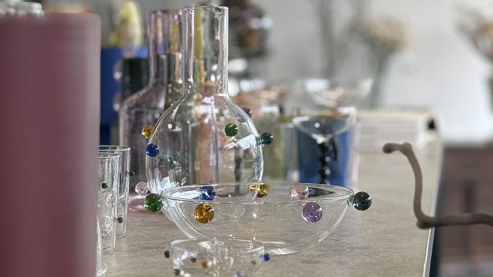 Decorative clear glass vases, bowls and drinkware featuring colourful glass bead details from Monet de Fleur.